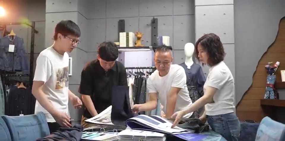 Reviewing fabric books with a client